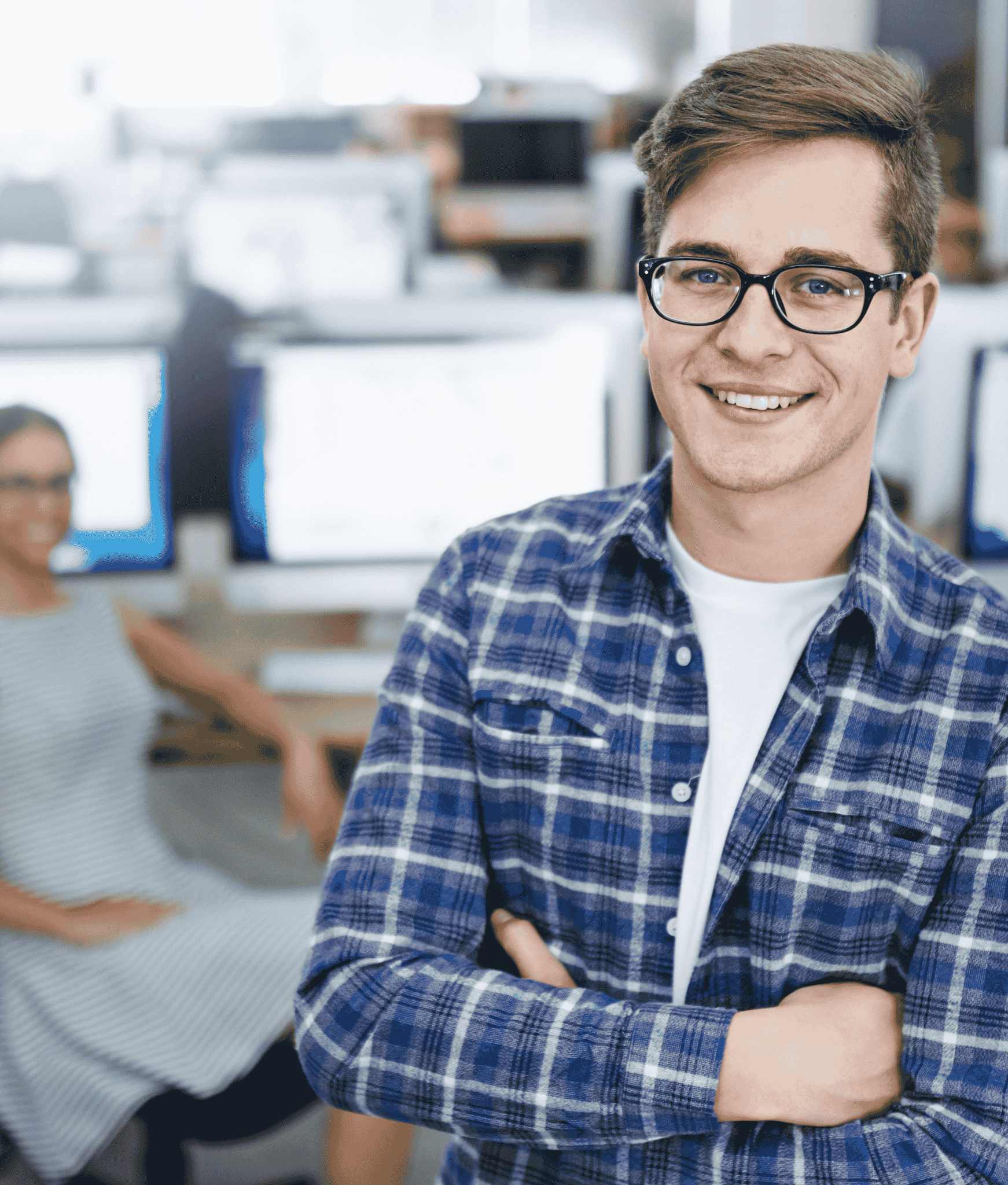 Young employee looking happy direct to camera